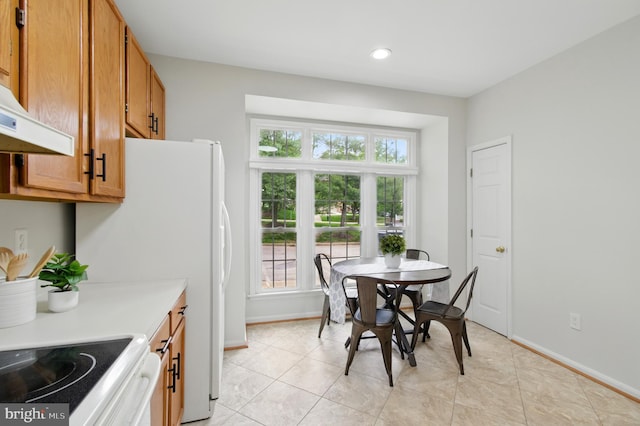 6201 Knolls Ct, Elkridge, MD 21075 - dining space featuring healthy amount of natural light, baseboards, recessed lighting, and light tile patterned floors