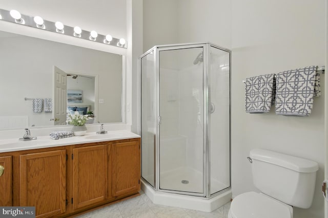 6201 Knolls Ct, Elkridge, MD 21075 - bathroom featuring a shower stall, toilet, and double vanity