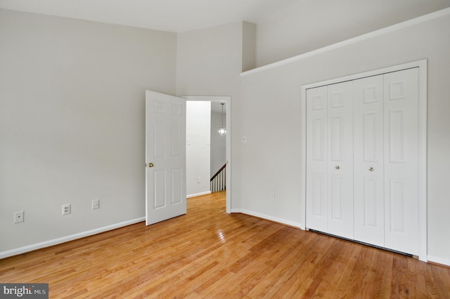 6201 Knolls Ct, Elkridge, MD 21075 - unfurnished bedroom with baseboards, light wood-style floors, and a closet