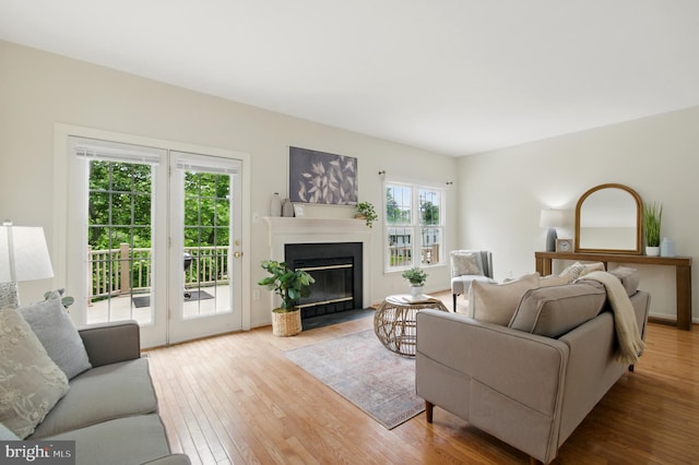6201 Knolls Ct, Elkridge, MD 21075 - living area with wood finished floors and a fireplace with flush hearth