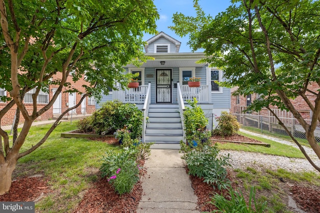 4909 Meade St NE, Washington, DC 20019 - view of front of house featuring covered porch and stairway