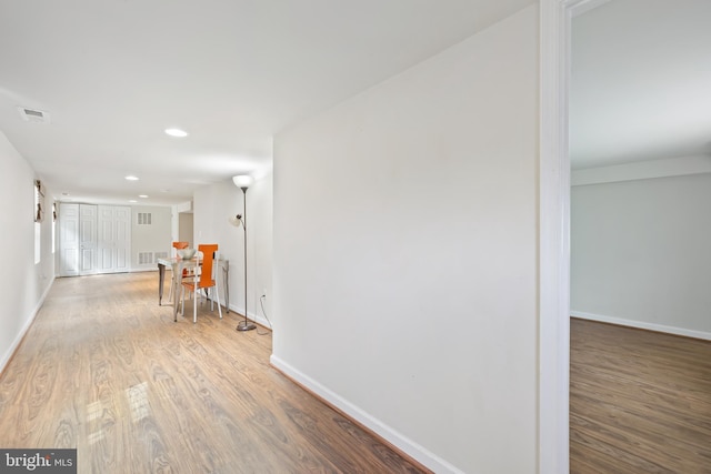 4909 Meade St NE, Washington, DC 20019 - corridor with wood finished floors, baseboards, and recessed lighting
