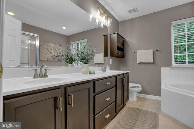 3061 Raking Leaf Dr, Abingdon, MD 21009 - full bath with double vanity, toilet, a bath, tile patterned floors, and baseboards