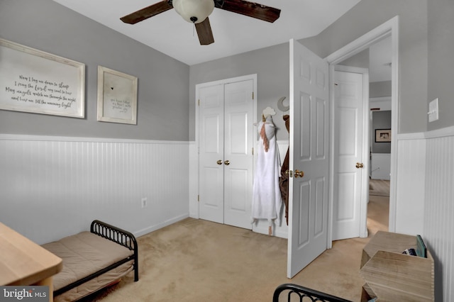 3061 Raking Leaf Dr, Abingdon, MD 21009 - living area featuring wainscoting, light carpet, and ceiling fan