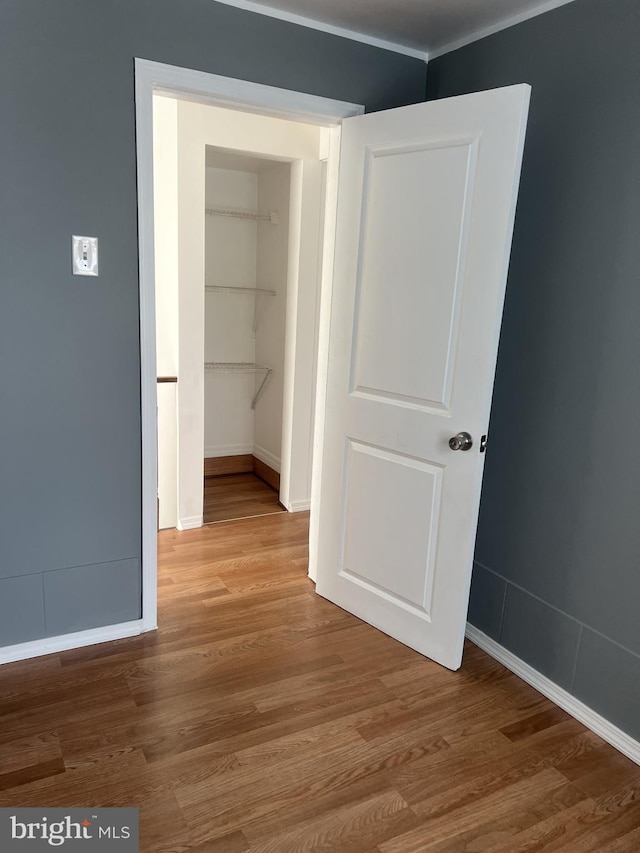 4839 Griscom St, Philadelphia, PA 19124 - hall featuring wood finished floors, baseboards, and crown molding