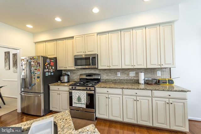 714 Shady Creek Ct, Bel Air, MD 21015 - kitchen with stainless steel appliances, decorative backsplash, dark wood-style floors, light stone countertops, and recessed lighting