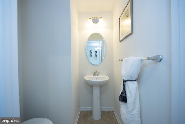 714 Shady Creek Ct, Bel Air, MD 21015 - half bath featuring tile patterned flooring, a sink, baseboards, and toilet