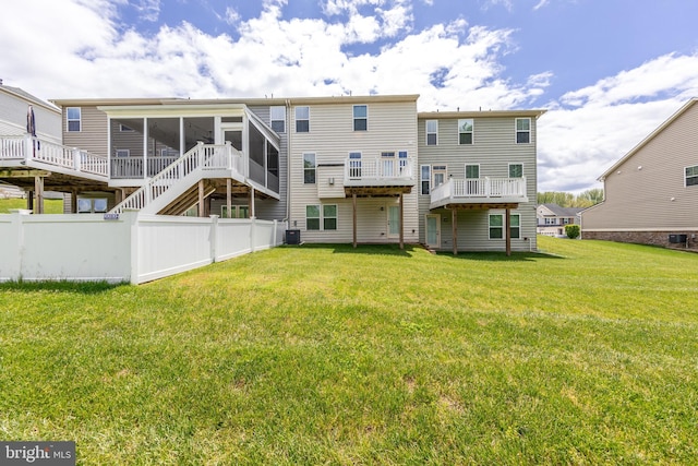 714 Shady Creek Ct, Bel Air, MD 21015 - back of property featuring a sunroom, a wooden deck, and central AC
