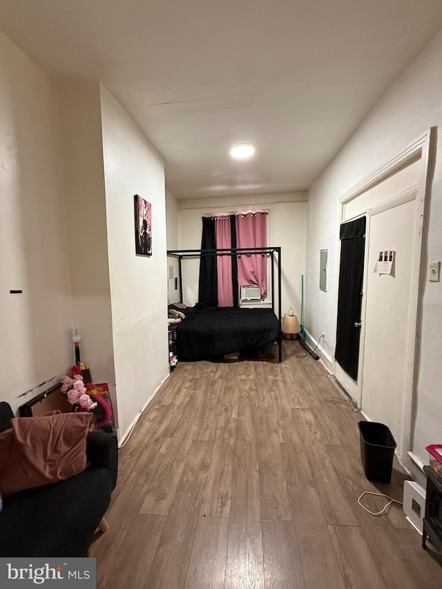 2338 W Hagert St, Philadelphia, PA 19132 - hallway featuring wood finished floors, electric panel, and cooling unit