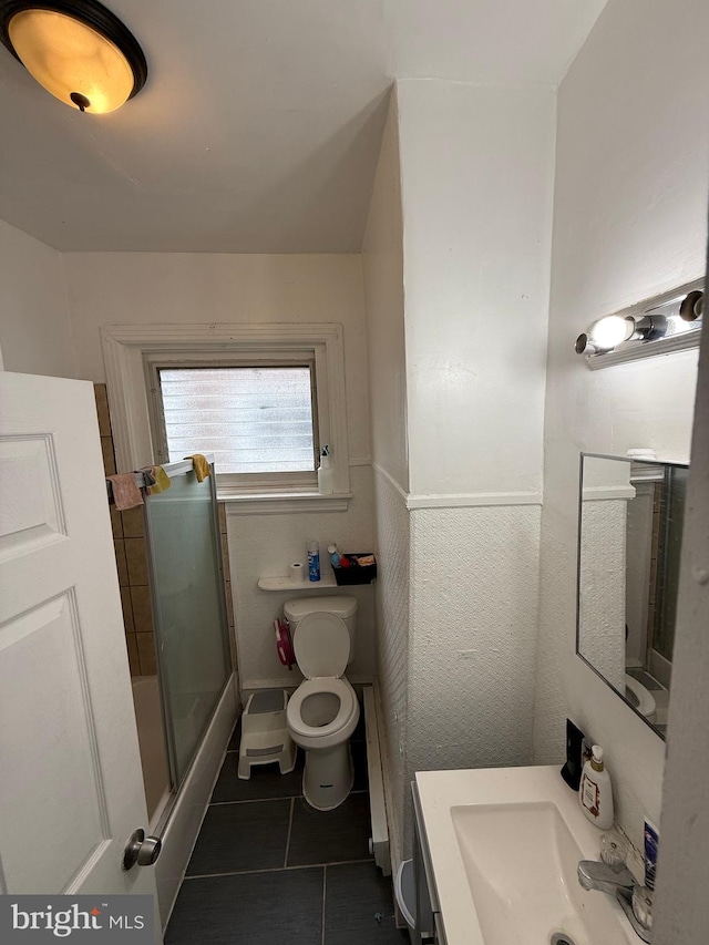 2338 W Hagert St, Philadelphia, PA 19132 - full bath with tile patterned flooring, toilet, and vanity