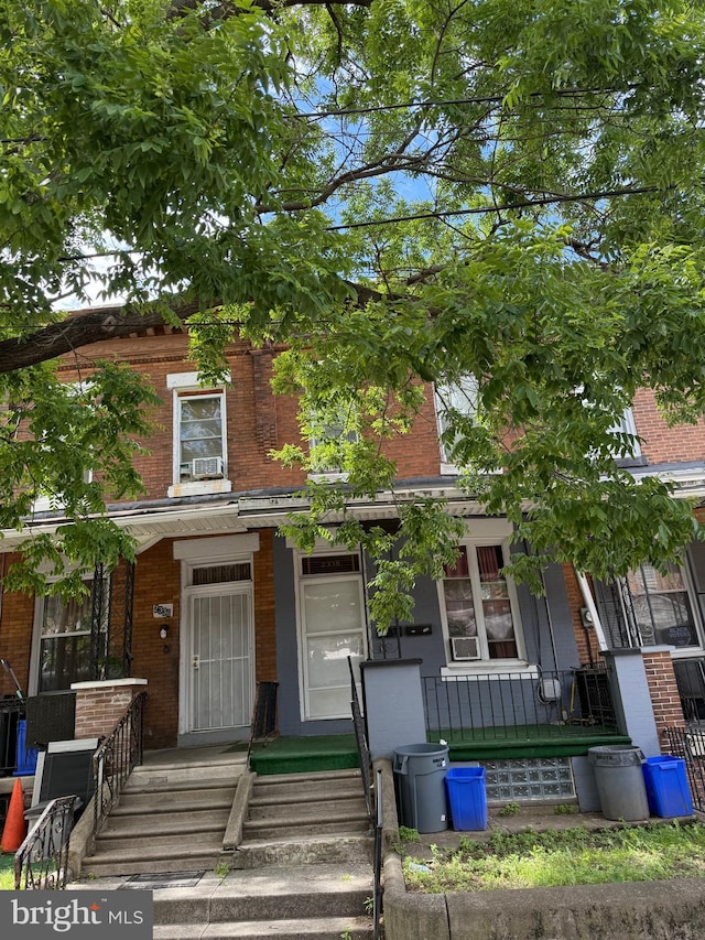 2338 W Hagert St, Philadelphia, PA 19132 - view of front of house featuring brick siding and a porch