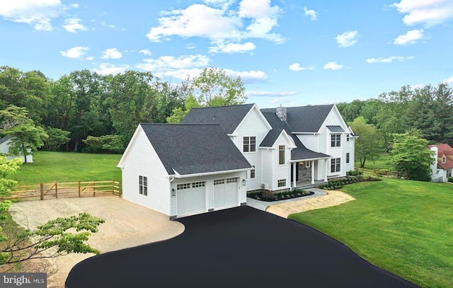 3718 Gradyville Rd, Newtown Square, PA 19073 - view of front of house with driveway, a garage, and roof with shingles