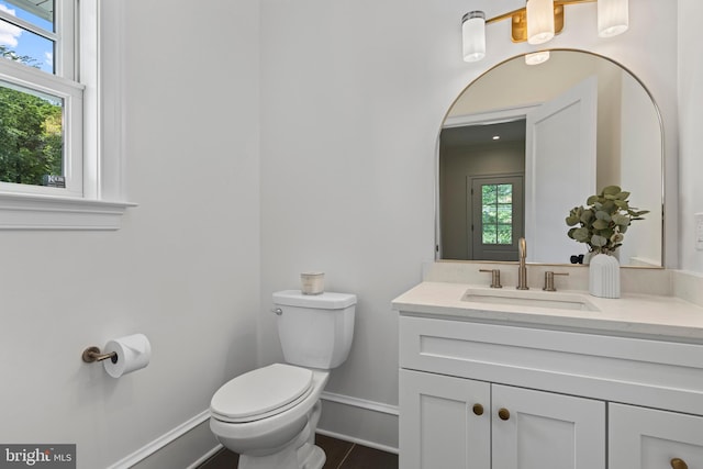 3718 Gradyville Rd, Newtown Square, PA 19073 - half bathroom with toilet, vanity, and baseboards