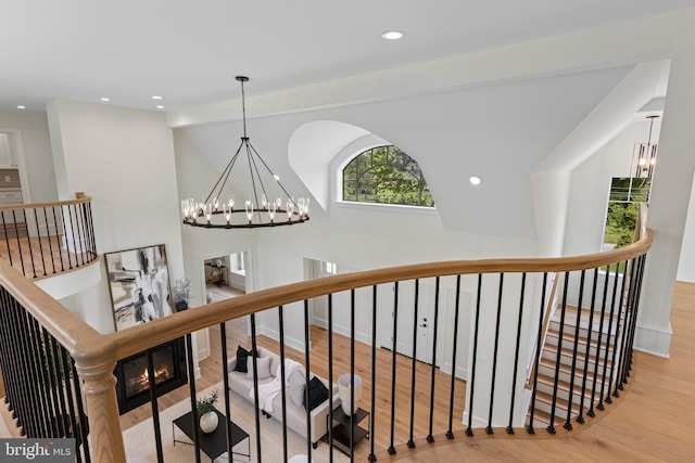 3718 Gradyville Rd, Newtown Square, PA 19073 - staircase with a chandelier, wood finished floors, recessed lighting, and baseboards