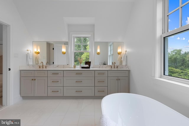 3718 Gradyville Rd, Newtown Square, PA 19073 - full bathroom featuring a soaking tub, double vanity, and a high ceiling