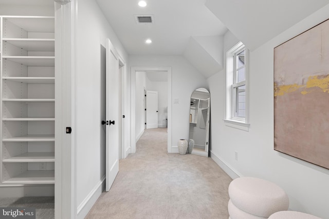 3718 Gradyville Rd, Newtown Square, PA 19073 - hall featuring light colored carpet, baseboards, recessed lighting, and arched walkways