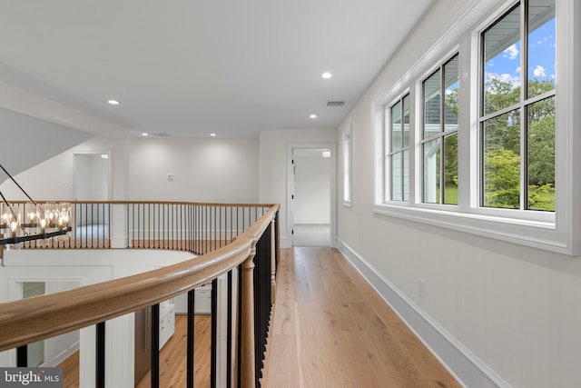 3718 Gradyville Rd, Newtown Square, PA 19073 - corridor featuring an upstairs landing, light wood-style floors, recessed lighting, a chandelier, and baseboards