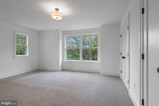 3718 Gradyville Rd, Newtown Square, PA 19073 - spare room featuring plenty of natural light, carpet flooring, and baseboards