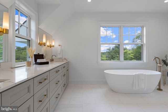 3718 Gradyville Rd, Newtown Square, PA 19073 - full bath with plenty of natural light, double vanity, a freestanding bath, and recessed lighting