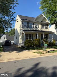 9901 Airedale Ct, Bristow, VA 20136 - traditional home featuring a porch