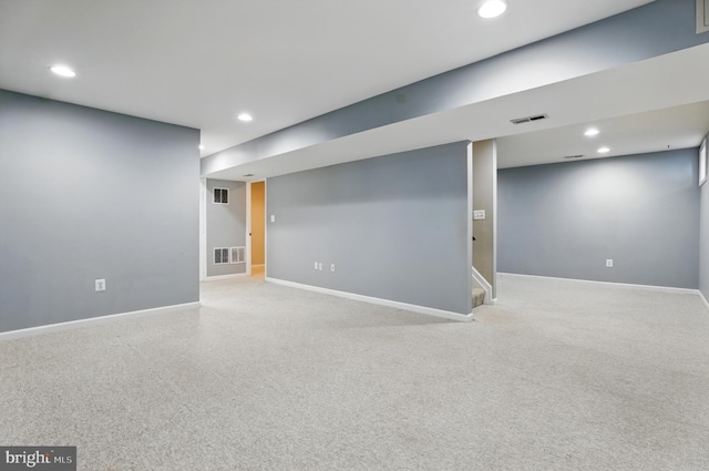 9901 Airedale Ct, Bristow, VA 20136 - finished basement featuring recessed lighting, stairs, and baseboards
