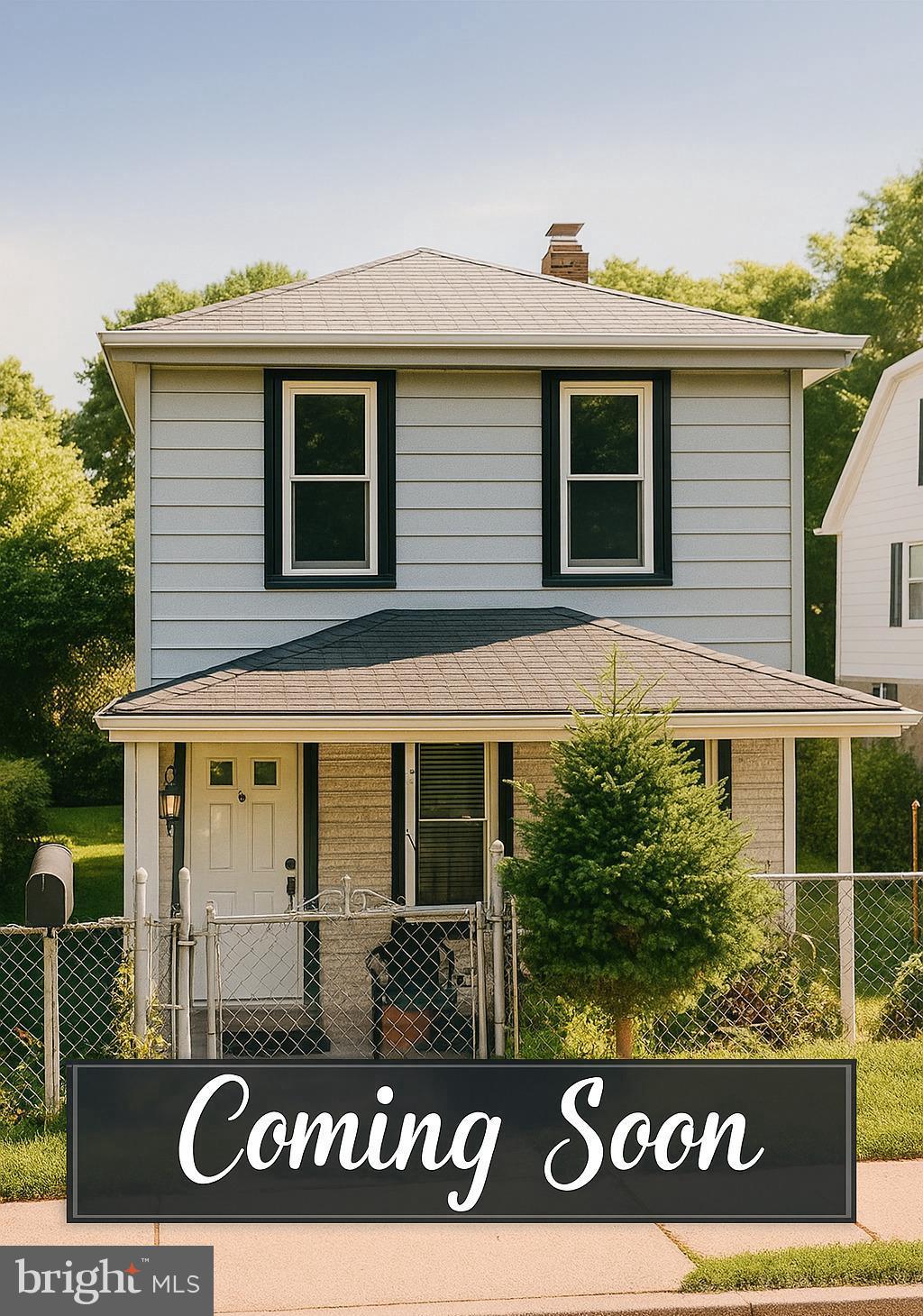6202 K St, Capitol Heights, MD 20743 - view of front of property with a chimney, covered porch, and roof with shingles