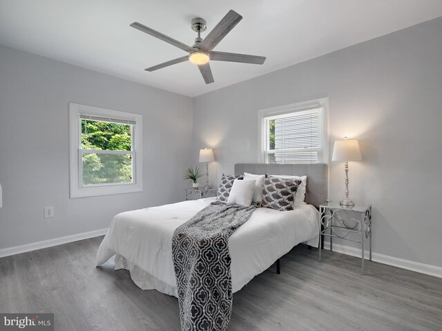 6202 K St, Capitol Heights, MD 20743 - bedroom with wood finished floors, baseboards, and a ceiling fan