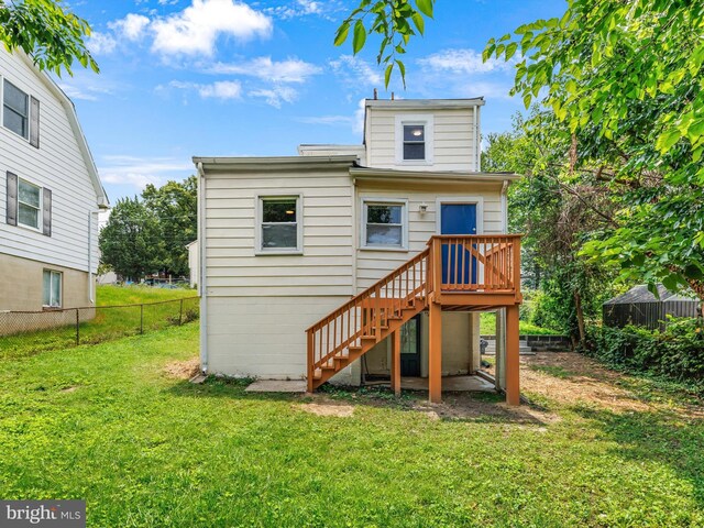 6202 K St, Capitol Heights, MD 20743 - back of house with stairway and a deck