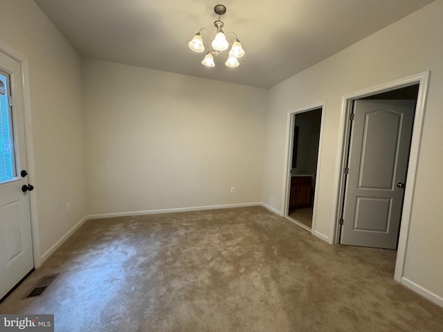 2410 Vineyard Springs Way, Ellicott City, MD 21043 - empty room featuring carpet flooring, a chandelier, and baseboards