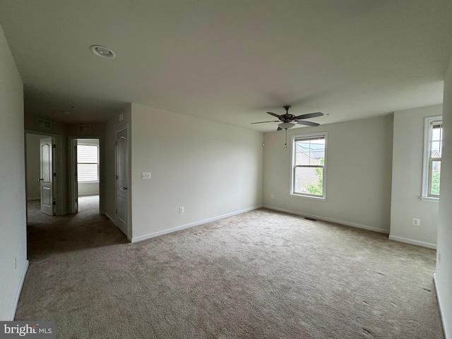 2410 Vineyard Springs Way, Ellicott City, MD 21043 - spare room featuring carpet, baseboards, and a ceiling fan