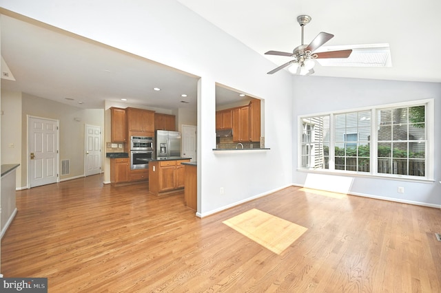 10861 Hunter Gate Way, Reston, VA 20194 - unfurnished living room with ceiling fan, light wood-style flooring, recessed lighting, and lofted ceiling
