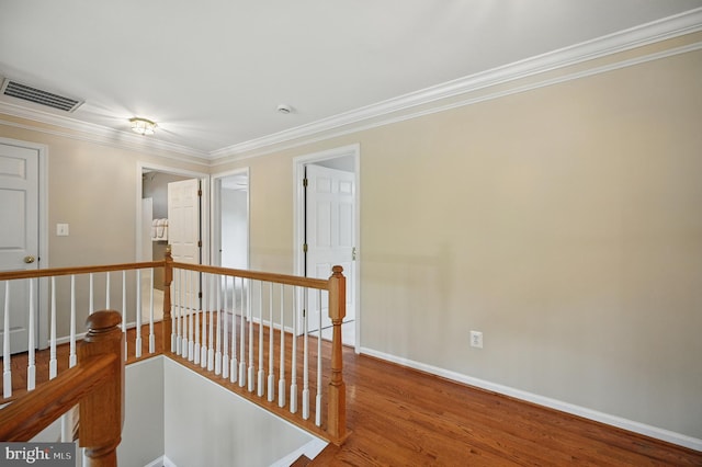 10861 Hunter Gate Way, Reston, VA 20194 - corridor with an upstairs landing, crown molding, and wood finished floors