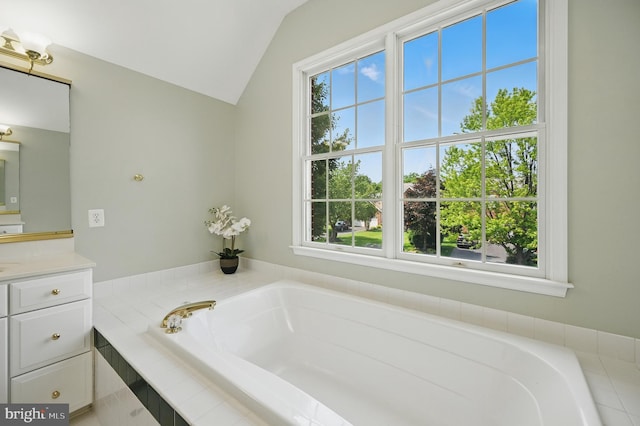 10861 Hunter Gate Way, Reston, VA 20194 - bathroom with vanity, vaulted ceiling, and a bath