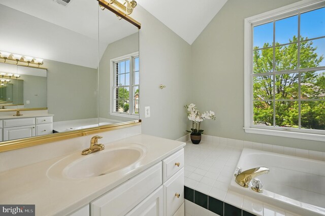 10861 Hunter Gate Way, Reston, VA 20194 - full bathroom featuring lofted ceiling, vanity, and a garden tub
