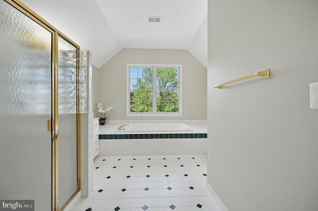 10861 Hunter Gate Way, Reston, VA 20194 - full bathroom featuring tile patterned flooring, a garden tub, a stall shower, and lofted ceiling