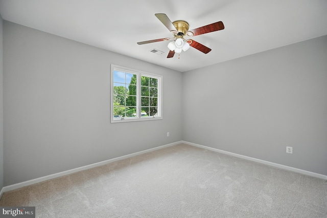 10861 Hunter Gate Way, Reston, VA 20194 - spare room featuring light carpet and a ceiling fan