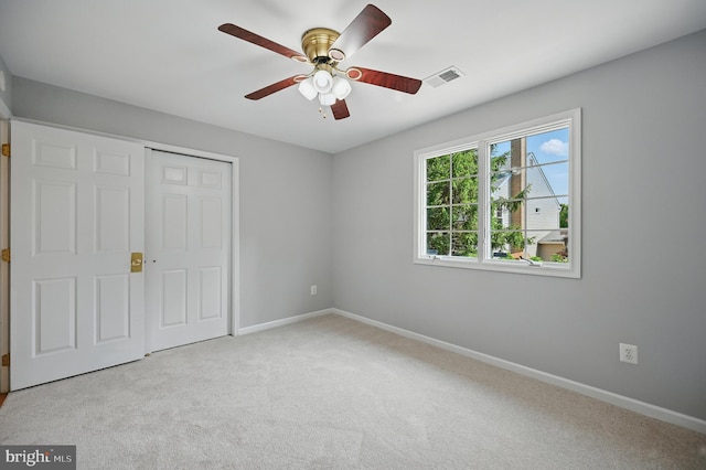 10861 Hunter Gate Way, Reston, VA 20194 - unfurnished bedroom with light carpet, a closet, and ceiling fan