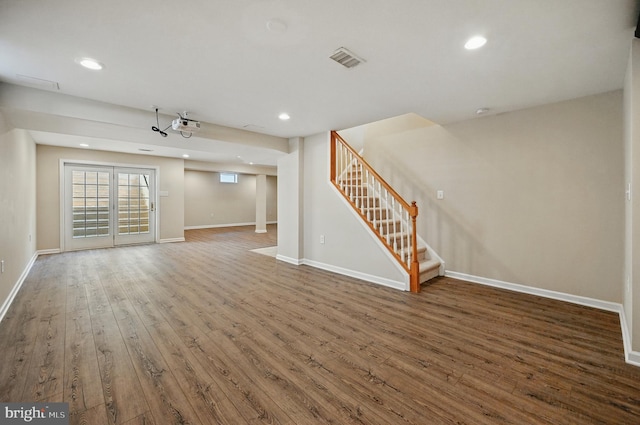 10861 Hunter Gate Way, Reston, VA 20194 - unfurnished living room featuring hardwood / wood-style flooring, stairs, and recessed lighting