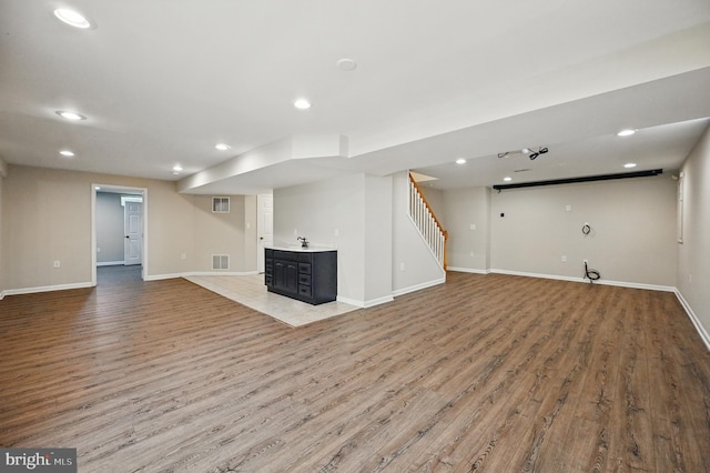 10861 Hunter Gate Way, Reston, VA 20194 - finished below grade area with light wood-type flooring, stairway, and recessed lighting