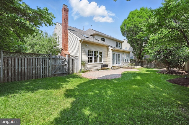 10861 Hunter Gate Way, Reston, VA 20194 - rear view of property featuring a patio, entry steps, a gate, a fenced backyard, and a chimney