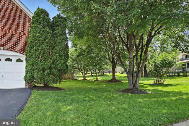 10861 Hunter Gate Way, Reston, VA 20194 - view of yard featuring a garage