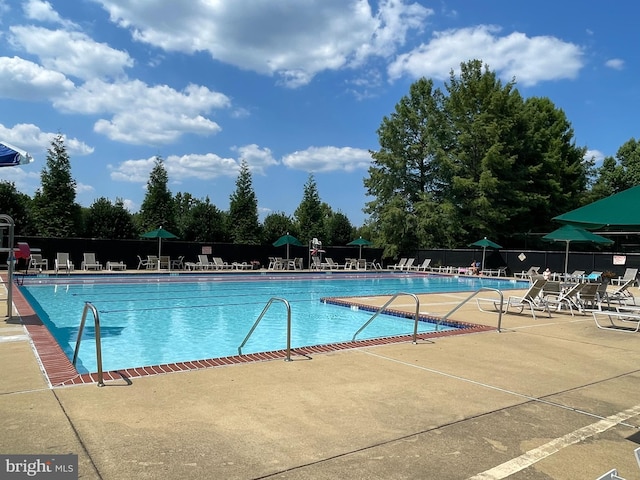 10861 Hunter Gate Way, Reston, VA 20194 - community pool featuring a patio