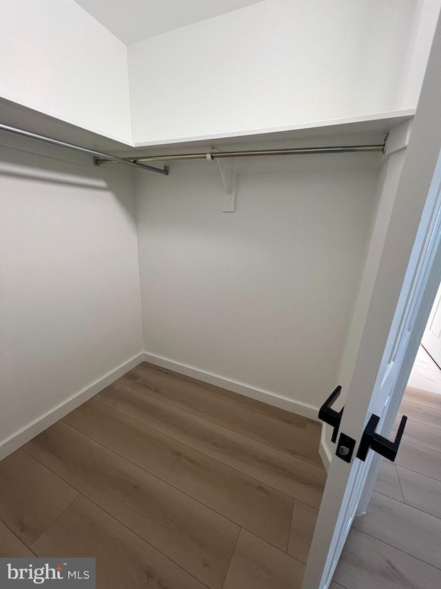 307 Yoakum Pkwy Unit 1801, Alexandria, VA 22304 - walk in closet with wood finished floors
