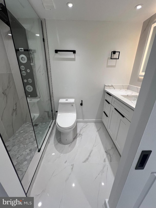 307 Yoakum Pkwy Unit 1801, Alexandria, VA 22304 - bathroom with marble finish floors, toilet, a marble finish shower, vanity, and baseboards