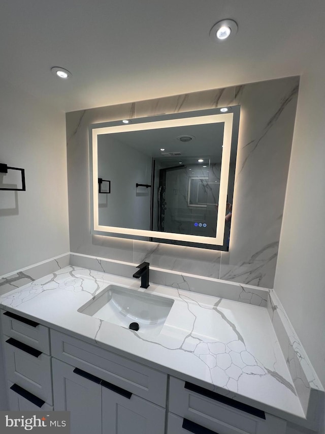 307 Yoakum Pkwy Unit 1801, Alexandria, VA 22304 - full bath with vanity, a marble finish shower, and recessed lighting