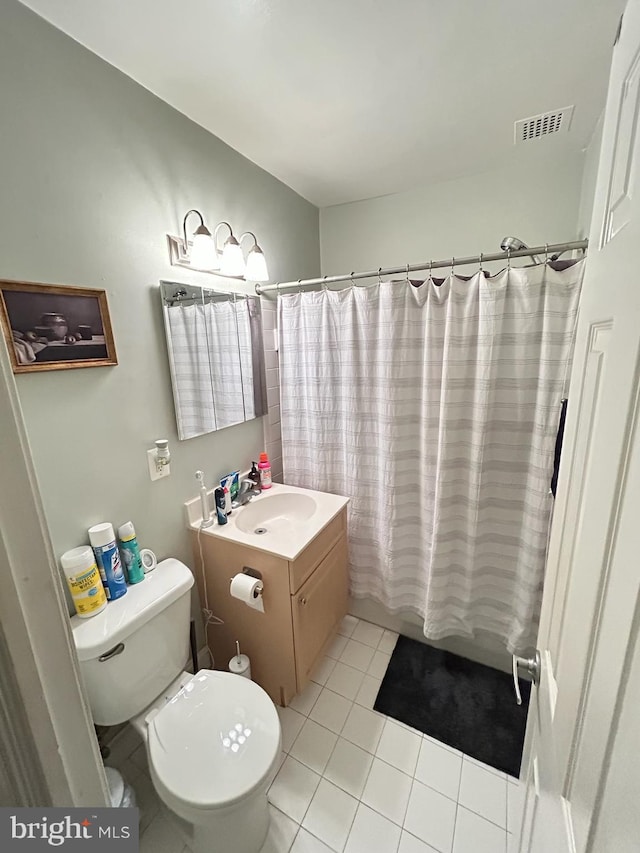 1005 Chillum Rd Unit 415, Hyattsville, MD 20782 - full bath with vanity, toilet, and tile patterned flooring