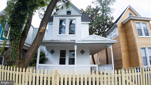 405 Calvin Ave, Baltimore, MD 21218 - victorian house featuring a porch