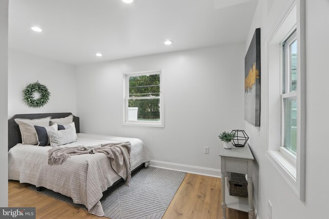 405 Calvin Ave, Baltimore, MD 21218 - bedroom with recessed lighting, wood finished floors, and baseboards