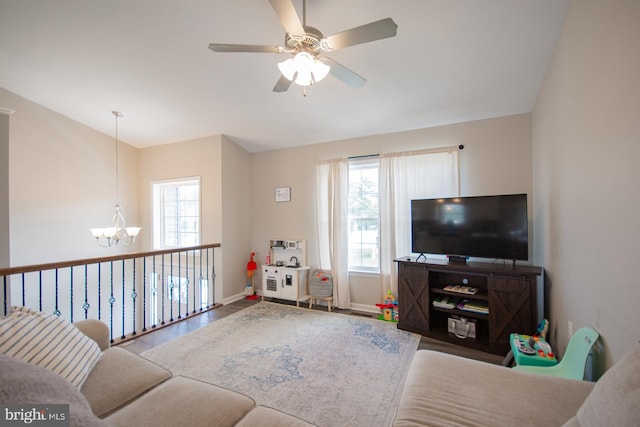 316 Pochards Ct, Martinsburg, WV 25403 - living area featuring a chandelier, a ceiling fan, wood finished floors, and baseboards