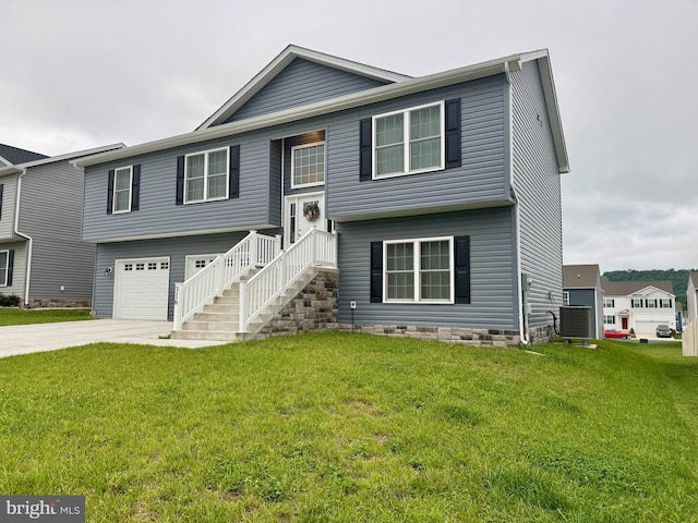 316 Pochards Ct, Martinsburg, WV 25403 - bi-level home featuring central air condition unit, concrete driveway, an attached garage, and a front yard